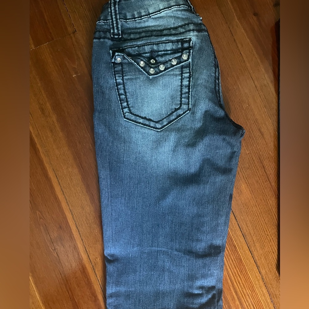 YMI jeans size 5/34 inseam. Rhinestone detail on back pockets.